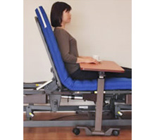 Tableware may fall off the table when the bed is raised without removing the table.